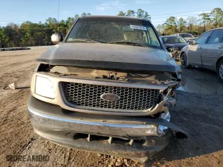 2001 Ford F-150 SuperCrew XLT with VIN 1FTRW07W31KA86300, listed as a Copart auction lot 57283434 with 129,416 mi miles and Salvage Title. Bid and sale history available at carsss.com. Image 5.