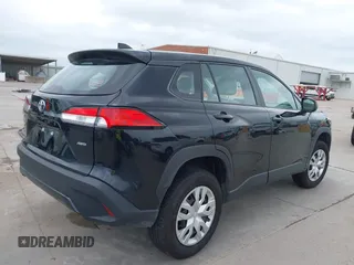 2024 Toyota Corolla Cross L with VIN 7MUAAABG0RV084192, listed as a IAAI auction lot 42137440 with 18,034 mi miles and . Bid and sale history available at DreamBid. Image 4.
