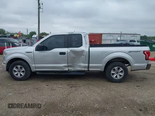 2015 Ford F-150 XL with VIN 1FTEX1C8XFKD19587, listed as a IAAI auction lot 42315673 with 220,319 mi miles and . Bid and sale history available at DreamBid. Image 14.