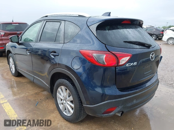 2015 Mazda CX-5 Touring with VIN JM3KE2CY5F0449195, listed as a IAAI auction lot 41894567 with 124,694 mi miles and . Bid and sale history available at DreamBid. Image 3.
