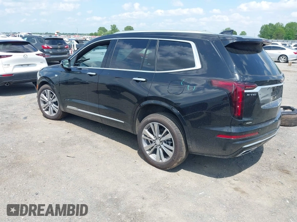 2025 Cadillac XT6 AWD Premium Luxury with VIN 1GYKPDRS3SZ118214, listed as a IAAI auction lot 42100315 with 12,795 mi miles and . Bid and sale history available at DreamBid. Image 3.