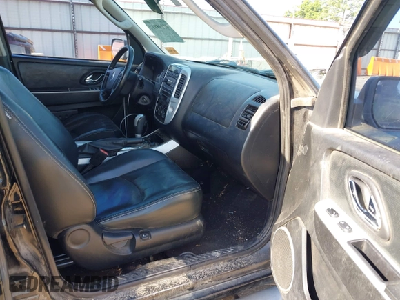 2006 Mercury Mariner Luxury с VIN 4M2CU56146KJ04819, выставлен на аукционе IAAI как лот 42248117 с пробегом 184 729 миль миль и . История ставок и продаж доступна на DreamBid. Изображение 5.
