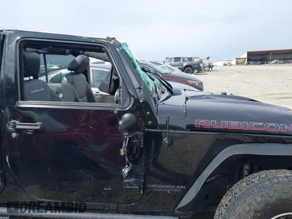 2015 Jeep Wrangler Unlimited Rubicon z VIN 1C4BJWFG7FL711036, wystawiony jako IAAI lot #41604648 z przebiegiem 167 678 mil mil oraz . Historia ofert i sprzedaży dostępna na DreamBid. Obrazek 15.