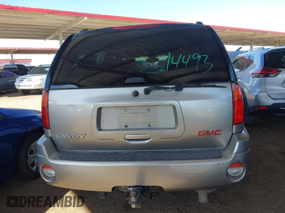 2003 GMC Envoy SLT with VIN 1GKDS13S732346641, listed as a IAAI auction lot 42111222 with 291,231 mi miles and . Bid and sale history available at DreamBid. Image 17.