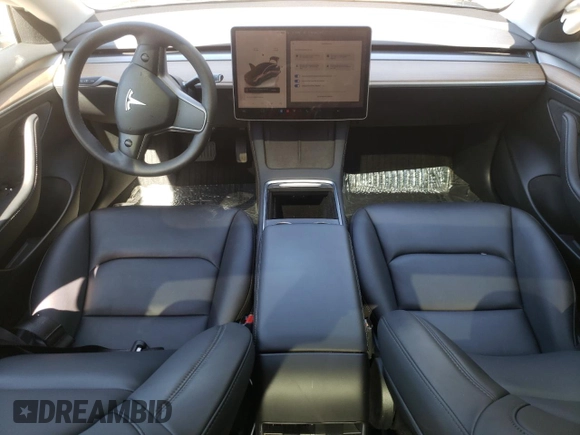 2023 Tesla Model 3 with VIN 5YJ3E1EA1PF664941, listed as a Copart auction lot 58097005 with 39,391 mi miles and Salvage title. Bid and sale history available at DreamBid. Image 8.