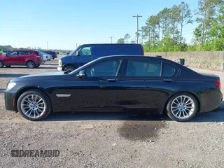 2015 BMW 7 Series 750Li with VIN WBAYE8C50FD781384, listed as a IAAI auction lot 42049829 with 128,087 mi miles and . Bid and sale history available at carsss.com. Image 14.