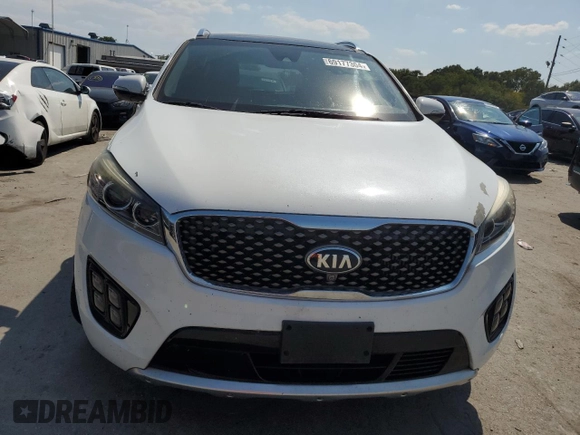 2016 Kia Sorento SXL with VIN 5XYPK4A10GG055107, listed as a Copart auction lot 69177304 with 138,300 mi miles and Salvage Title. Bid and sale history available at carsss.com. Image 5.