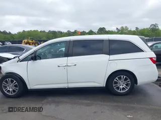 2012 Honda Odyssey EX-L with VIN 5FNRL5H60CB134954, listed as a IAAI auction lot 41942488 with 192,069 mi miles and . Bid and sale history available at DreamBid. Image 15.