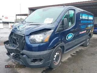2021 Ford Transit Cargo with VIN 1FTBR1Y80MKA12125, listed as a IAAI auction lot 41773493 with 42,989 mi miles and . Bid and sale history available at DreamBid. Image 17.
