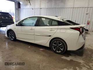 2020 Toyota Prius L Eco z VIN JTDKARFU9L3106230, wystawiony jako Copart lot #43336865 z przebiegiem 34 116 mil mil oraz Nie do naprawy • Non repairable. Historia ofert i sprzedaży dostępna na DreamBid. Obrazek 2.