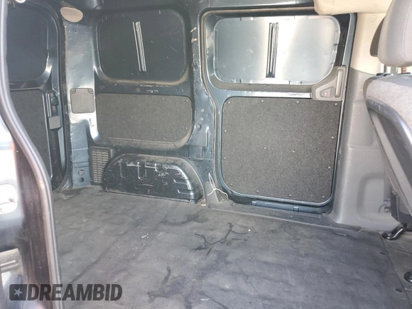 2017 Nissan NV200 SV z VIN 3N6CM0KNXHK699021, wystawiony jako Copart lot #52178855 z przebiegiem 156 325 mil mil oraz Szkoda całkowita • Salvage title. Historia ofert i sprzedaży dostępna na DreamBid. Obrazek 11.