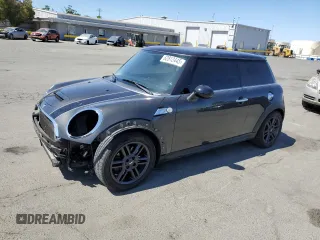 2012 MINI Hardtop S with VIN WMWSV3C57CTY16657, listed as a Copart auction lot 62812445 with 122,796 mi miles and Salvage title. Bid and sale history available at DreamBid. Image 1.