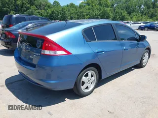 2010 Honda Insight LX with VIN JHMZE2H56AS013649, listed as a IAAI auction lot 42646690 with 5,593 mi miles and . Bid and sale history available at DreamBid. Image 4.