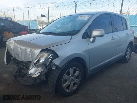 2009 Nissan Versa 1.8 SL with VIN 3N1BC13E29L406619, listed as a IAAI auction lot 41761728 with 115,510 mi miles. Bid and sale history available at carsss.com. Image 2.