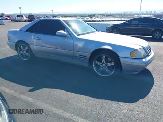 2000 Mercedes-Benz SL 500 z VIN WDBFA68F3YF193156, wystawiony jako IAAI lot #42207583 z przebiegiem 188 675 mil mil oraz . Historia ofert i sprzedaży dostępna na DreamBid. Obrazek 1.