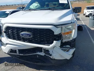 2021 Ford F-150 XL with VIN 1FTEW1CP2MKE42968, listed as a IAAI auction lot 42022454 with 32,908 mi miles. Bid and sale history available at carsss.com. Image 6.