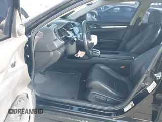 2016 Honda Civic EX-L with VIN 2HGFC1F79GH659164, listed as a IAAI auction lot 42455097 with 166,157 mi miles and . Bid and sale history available at DreamBid. Image 5.