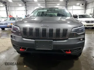 2019 Jeep Cherokee Trailhawk Elite with VIN 1C4PJMBNXKD182846, listed as a Copart auction lot 84090984 with 79,212 mi miles and Salvage title. Bid and sale history available at DreamBid. Image 5.