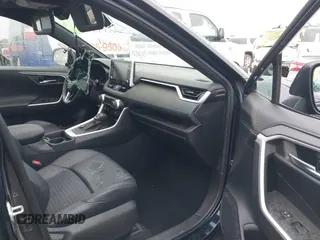 2021 Toyota RAV4 Hybrid XSE with VIN 2T3E6RFV5MW002856, listed as a IAAI auction lot 42387921 with Not provided miles and . Bid and sale history available at DreamBid. Image 5.