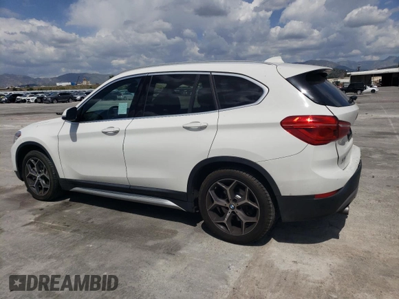 2018 BMW X1 xDrive28i with VIN WBXHT3C35J5L26952, listed as a Copart auction lot 51715035 with 63,306 mi miles and Salvage Title. Bid and sale history available at carsss.com. Image 2.