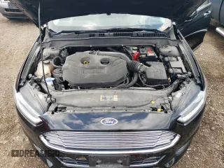 2016 Ford Fusion Titanium z VIN 3FA6P0K90GR399896, wystawiony jako Copart lot #63504265 z przebiegiem 37 066 mil mil oraz Szkoda całkowita • Salvage title. Historia ofert i sprzedaży dostępna na DreamBid. Obrazek 11.