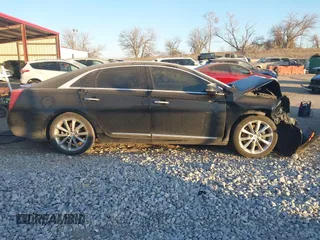 2014 Cadillac XTS Luxury with VIN 2G61M5S32E9289279, listed as a IAAI auction lot 41279495 with 106,655 mi miles. Bid and sale history available at carsss.com. Image 14.