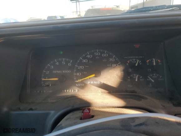 1999 Chevrolet Tahoe Z71 with VIN 1GNEK13R9XJ381424, listed as a Copart auction lot 79940494 with 164,231 mi miles and Salvage Title. Bid and sale history available at carsss.com. Image 9.