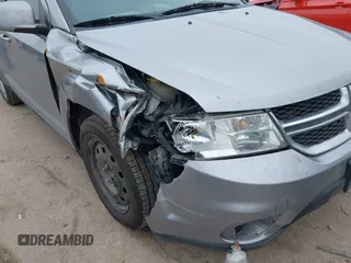 2019 Dodge Journey SE with VIN 3C4PDCBB0KT816103, listed as a IAAI auction lot 41640272 with 118,310 mi miles and . Bid and sale history available at DreamBid. Image 6.
