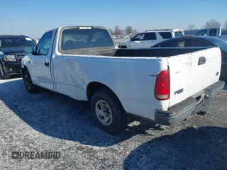 2003 Ford F-150 XL with VIN 1FTRF17W13NB65293, listed as a IAAI auction lot 41264978 with Not Provided miles and . Bid and sale history available at DreamBid. Image 3.