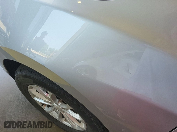 2020 Chevrolet Equinox LT with VIN 2GNAXJEV0L6236404, listed as a IAAI auction lot 42619695 with 77,124 mi miles and . Bid and sale history available at DreamBid. Image 12.