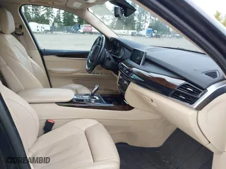 2015 BMW X5 xDrive35d with VIN 5UXKS4C55F0J98874, listed as a IAAI auction lot 42030583 with 151,079 mi miles. Bid and sale history available at carsss.com. Image 5.