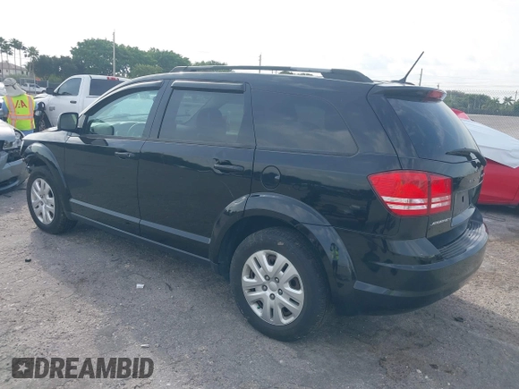 2017 Dodge Journey SE with VIN 3C4PDCAB4HT691343, listed as a IAAI auction lot 41863725 with 99,519 mi miles and . Bid and sale history available at carsss.com. Image 3.