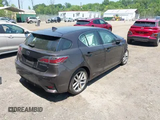 2015 Lexus CT 200h with VIN JTHKD5BH2F2238568, listed as a IAAI auction lot 42429699 with 146,825 mi miles and . Bid and sale history available at DreamBid. Image 4.