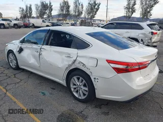 2015 Toyota Avalon Limited with VIN 4T1BK1EB0FU158712, listed as a IAAI auction lot 41436341 with 127,752 mi miles and . Bid and sale history available at DreamBid. Image 3.