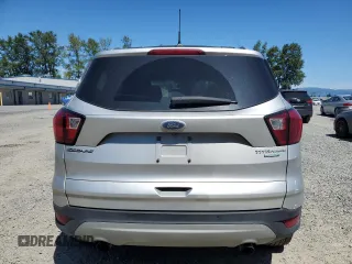 2019 Ford Escape Titanium z VIN 1FMCU0J92KUB62184, wystawiony jako Copart lot #63027765 z przebiegiem 136 005 mil mil oraz Czysty tytuł • Clean title. Historia ofert i sprzedaży dostępna na DreamBid. Obrazek 6.
