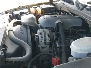 2004 Chevrolet Silverado 1500 LS with VIN 1GCEC19T74Z153038, listed as a IAAI auction lot 43055073 with 184,696 mi miles and . Bid and sale history available at DreamBid. Image 13.