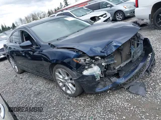 2015 Mazda 6 i Touring with VIN JM1GJ1V52F1185998, listed as a IAAI auction lot 41921373 with 101,306 mi miles and . Bid and sale history available at DreamBid. Image 1.