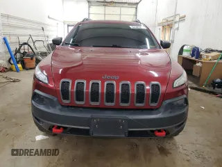 2015 Jeep Cherokee Trailhawk z VIN 1C4PJMBS9FW509642, wystawiony jako Copart lot #52385555 z przebiegiem 135 477 mil mil oraz Szkoda całkowita • Salvage title. Historia ofert i sprzedaży dostępna na DreamBid. Obrazek 5.