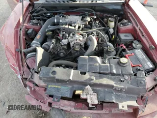 2004 Ford Mustang GT Deluxe z VIN 1FAFP42X54F221786, wystawiony jako Copart lot #47560645 z przebiegiem 138 407 mil mil oraz Szkoda całkowita • Salvage title. Historia ofert i sprzedaży dostępna na DreamBid. Obrazek 12.