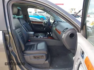 2010 Volkswagen Touareg VR6 with VIN WVGBF7A96AD002466, listed as a IAAI auction lot 41709052 with 204,819 mi miles and . Bid and sale history available at DreamBid. Image 5.