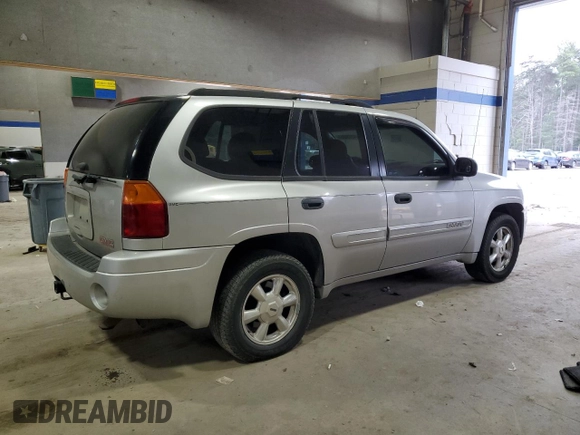 2005 GMC Envoy SLT with VIN 1GKDT13S652197929, listed as a Copart auction lot 42104855 with 228,515 mi miles and Salvage Title. Bid and sale history available at carsss.com. Image 3.