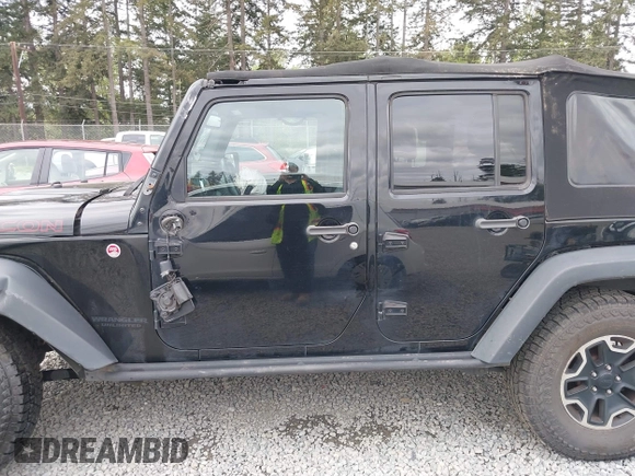 2015 Jeep Wrangler Unlimited Rubicon Hard Rock with VIN 1C4HJWFG6FL757421, listed as a IAAI auction lot 42107514 with 63,997 mi miles and . Bid and sale history available at DreamBid. Image 15.