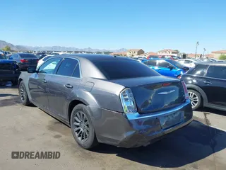 2014 Chrysler 300 with VIN 2C3CCAAG1EH191375, listed as a IAAI auction lot 41867688 with 218,740 mi miles. Bid and sale history available at carsss.com. Image 3.