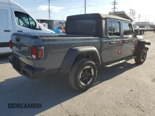 2021 Jeep Gladiator Willys z VIN 1C6HJTAG4ML517715, wystawiony jako Copart lot #52938125 z przebiegiem 21 187 mil mil oraz Szkoda całkowita • Salvage title. Historia ofert i sprzedaży dostępna na DreamBid. Obrazek 3.