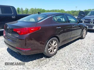 2011 Kia Optima EX with VIN KNAGN4A79B5129697, listed as a IAAI auction lot 42039540 with 226,627 mi miles and . Bid and sale history available at carsss.com. Image 4.