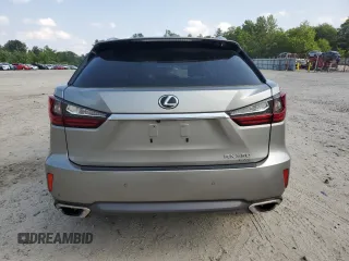 2017 Lexus RX 350 z VIN 2T2BZMCA5HC108427, wystawiony jako Copart lot #60498915 z przebiegiem 103 071 mil mil oraz Szkoda całkowita • Salvage title. Historia ofert i sprzedaży dostępna na DreamBid. Obrazek 6.