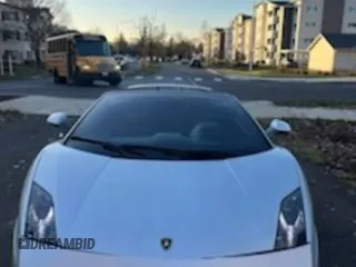 2013 Lamborghini Gallardo z VIN ZHWGU6BZ7DLA12811, wystawiony jako Copart lot #42301395 z przebiegiem 35 388 mil mil oraz Szkoda całkowita • Salvage title. Historia ofert i sprzedaży dostępna na DreamBid. Obrazek 9.