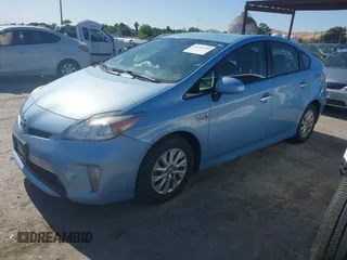 2014 Toyota Prius z VIN JTDKN3DP4E3060596, wystawiony jako IAAI lot #42344224 z przebiegiem 95 043 mil mil oraz . Historia ofert i sprzedaży dostępna na DreamBid. Obrazek 17.