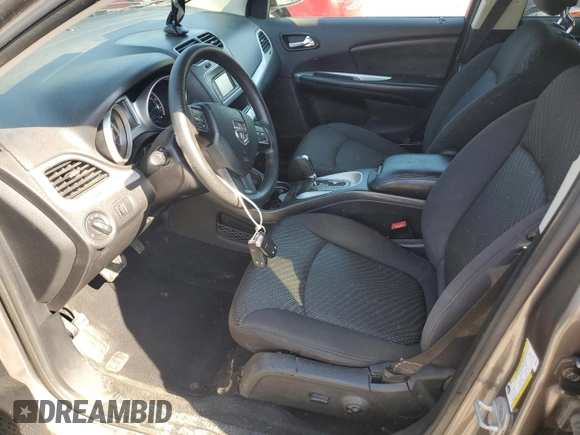 2013 Dodge Journey SXT with VIN 3C4PDCBGXDT630423, listed as a Copart auction lot 62359685 with 151,653 mi miles and Salvage title. Bid and sale history available at DreamBid. Image 7.