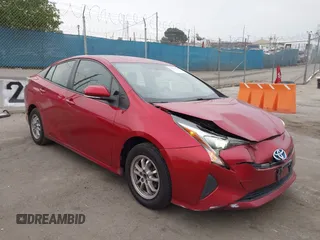 2016 Toyota Prius Two z VIN JTDKBRFU4G3531941, wystawiony jako IAAI lot #42023633 z przebiegiem 249 098 mil mil oraz . Historia ofert i sprzedaży dostępna na DreamBid. Obrazek 1.